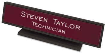 Need a custom desk name plate? Shop our 1 3/4" X 9" custom desk name plates with square corners and black plastic holder included at the EZ Custom Stamps Store.