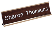 Looking for custom name plate desk signs? Shop our 2" X 8" custom name plate desk sign with standard aluminum desk holder inlcuded at the EZ Custom Stamps Store.