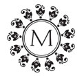 Looking for a custom monogram stamp? This round stamp features a floral swirl design with room for an initial in a color of your choice.
